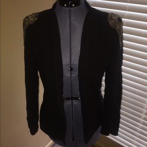 Never worn blazer. Beaded shoulders
